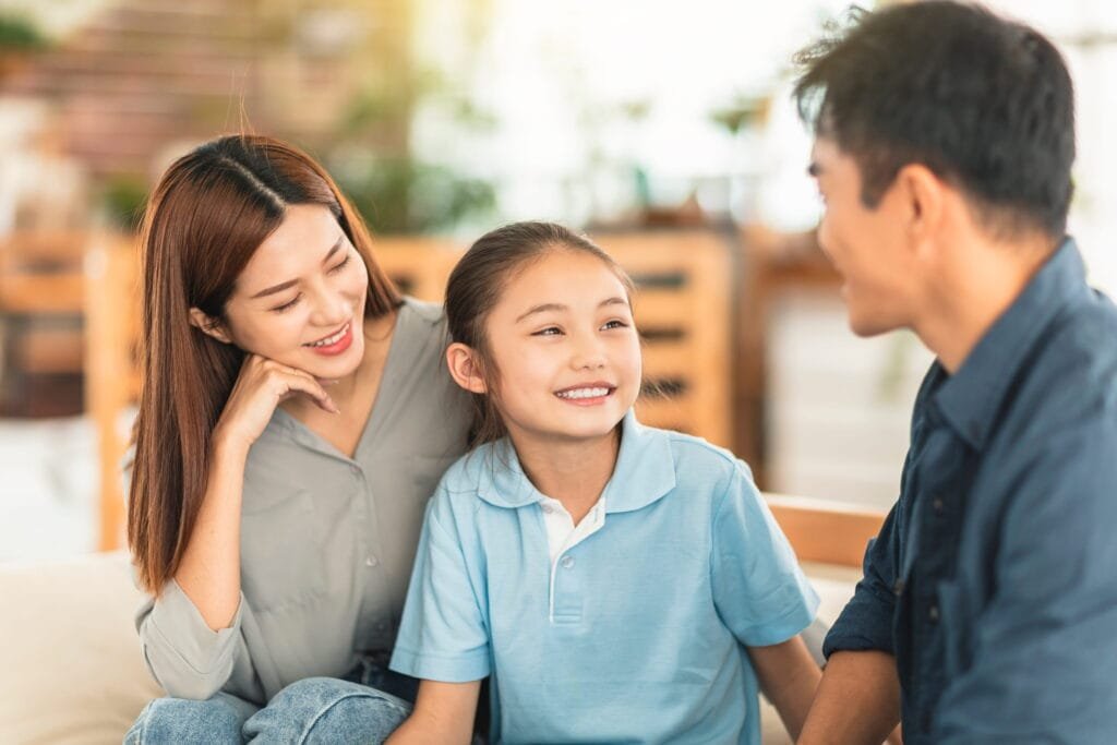 a family of three hanging out 